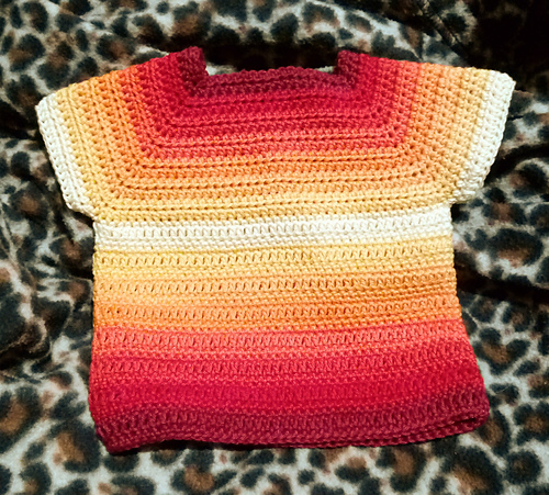 Ravelry: Sunset Cotton Baby Top pattern by Elise J. Mann