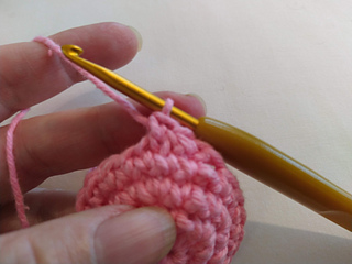 Make a standard single crochet to finish the invisible decrease.