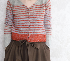 The pattern only includes instructions for solid color and does not mention stripes, but I think it would be fun to knit it with stripes in your favorite colors and widths if you like.