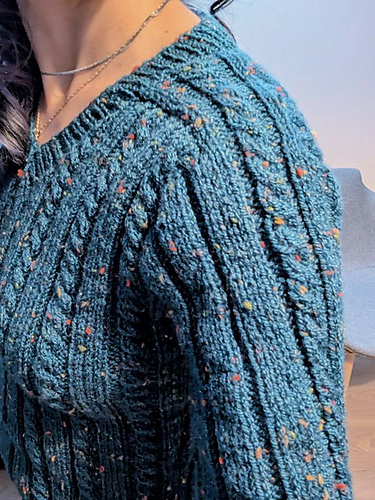Sara's cable knit sweater