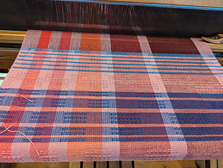 five sets of stripes, moving from black to light blue