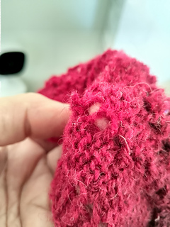 repaired cut found in first 10-15 rows of shawl.