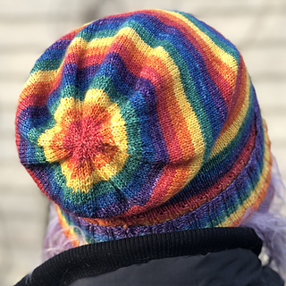 The view of the back of a slouchy hat showing concentric rainbow rings.