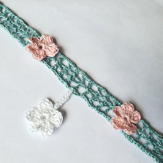 Light Green crochet lace strip, Simple Summer Sash, worked in fine thread as a choker, appliquéd with pink and white flowers (shown laid flat0.