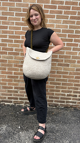 Functions as a messenger bag or backpack—the straps can be configured either way.