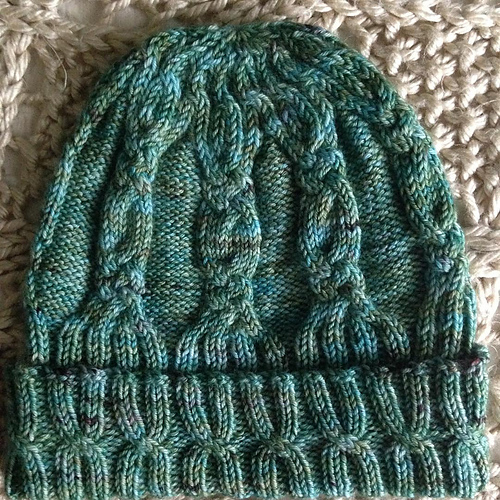 Ravelry Boysenberry Ripple Cabled Hat pattern by Sharyn Armstrong