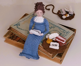 The "Jane Austen Doll" is a perfect match for the bookmark. You can find the link to the pattern on the right side of the text.
