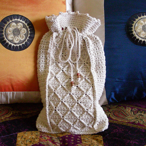 Ravelry Aran Hot Water Bottle Cover pattern by Kim Miller