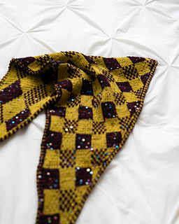 Harlequin Gambit draped to show the Checkmate motif, fabric and sequin detail.