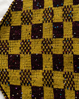 Checkmate close-up: double-knit fabric, colourwork and the Lunar sequin strand.