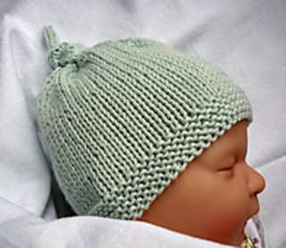 Ravelry Baby Hat With Top Knot Tegan Pattern By Julie Taylor