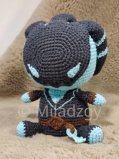 Thresh from League of Legends, crochet toy made by amigurumi technique. Used dark grey, turqoise and brown yarn. Front side.