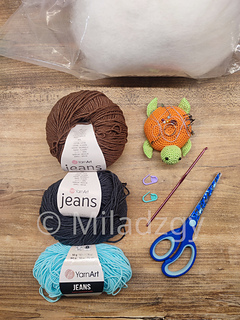 Thresh from League of Legends, crochet toy made by amigurumi technique. Used dark grey, turqoise and brown yarn. Materials used.