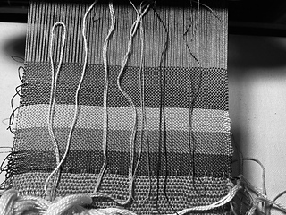 Sample ground cloths with proposed pattern wefts, looking for contrast