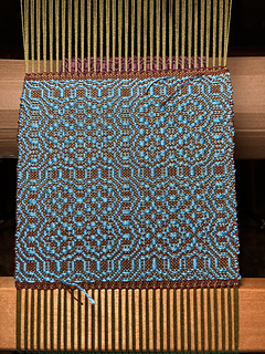 Kelp warp, burnt umber tabby weft, light blue pattern weft