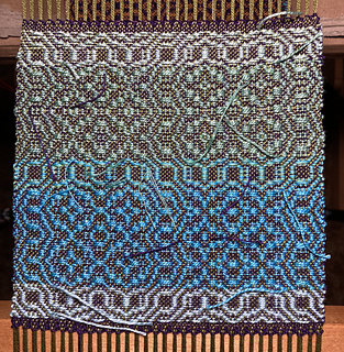 Lt blue, blue, blue-green, green, lt green fade, purple tabby weft