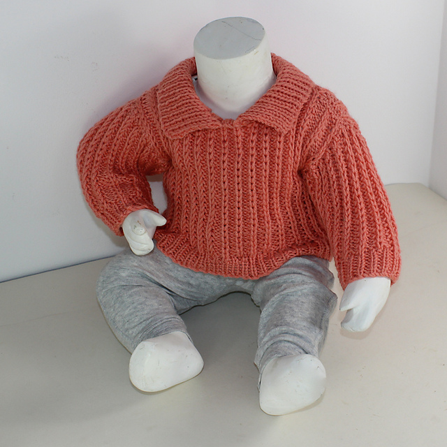 Ravelry Baby Aran Fishermans Rib Collar Sweater pattern by Christine Grant
