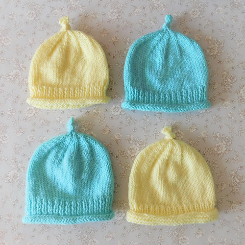 Ravelry Topsy Top Knot Hat pattern by marianna mel