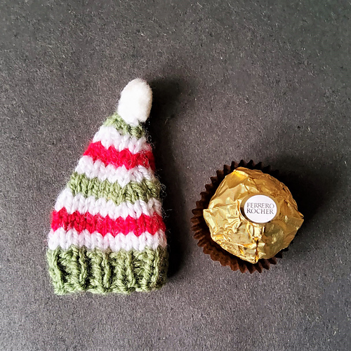 Ravelry Mini Santa Hat Elf Hat For Ferrero Rocher Pattern By ravelry-mini-santa-hat-elf-hat-for-ferrero-rocher-pattern-by