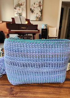This bag has good height and lots of volume for carrying a variety of items.