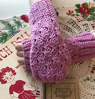 Mr. Milo Mitts have an elegant lace pattern on the top, framed by ribbed cuffs at the fingers and wrist.