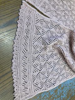 stole in fingering weight with knitted on edging