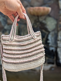 Everyday Crossbody Cotton Multi-Color mini bag with top handles and shoulder strap.