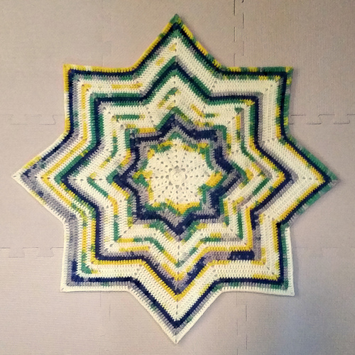 Ravelry: DK 8 Point Round Ripple Baby Blanket pattern by Samantha Attanasio