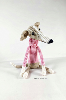Sleek Italian Greyhound crochet in beige with pink fake sweater with plastic eyes.