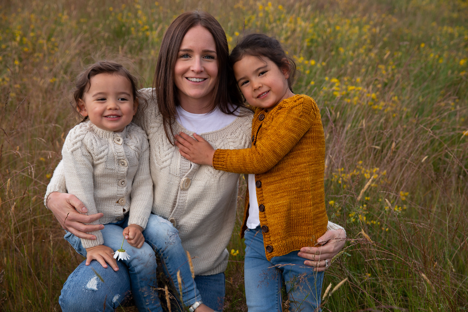 Antler Cardigan in beige, showing bold cable details