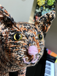 Attempted some REALLY subtle eye lids (one little strand of yarn)