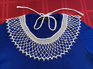 Customer photo. This was modified with tie closure. She adjusted the pattern slightly to accommodate her tighter crochet style. Turn out beautifully.
