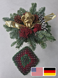 Crocheted granny square coaster and Christmas arrangement with US and German flags for the English and German pattern