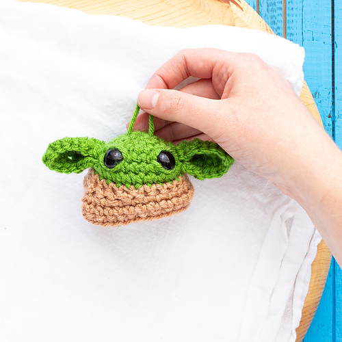 Ravelry Grogu Baby Yoda Ball Ornament pattern by Alex DellAringa