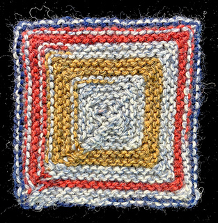 A 91-stitch Domino Box in Kroy Socks "Blue Striped Rag" yarn creates a different mood.
