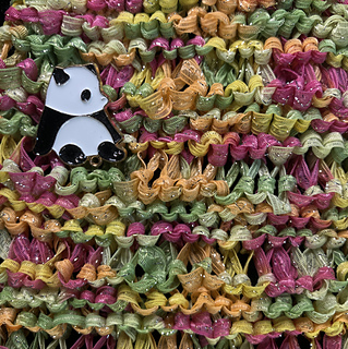 Detail of stitch pattern with ribbon yarn