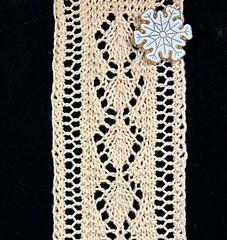 Buds of May appearing as knitted. Turn upside down for upward-facing buds.