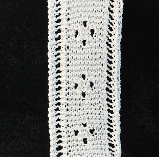A vertical photo to show how this strip would look in a scarf or afghan