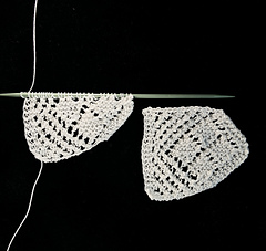 Don't worry when your first repeat looks strange. Once off the needles, it will behave. Bound-off swatch is unblocked.