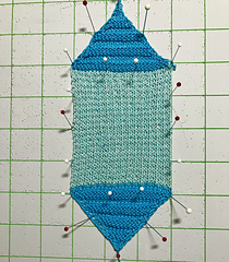 Another idea is to omit the side triangles and make long afghan strips with zigzag top and bottom edges.
