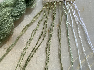 copper-mordanted fibres (L-R): Bond skein; Patons wool; Dorset; petting zoo; mohair; alpaca; silk; cotton; bamboo; viscose